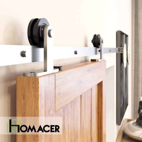 Side view of Brushed Nickel Sliding Barn Door Hardware Kit For One Door 5Ft Flat Track With T Shaped Rollers installed indoors.