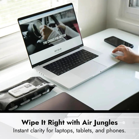 Streak Free Electronics Wipes Screen Cleaner 70 Count 8x10 No Cloth Needed on desk with laptop and hand using mouse