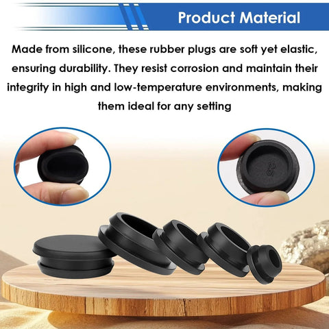 Close-up of black silicone rubber plugs from 65 Pcs Rubber Plugs For Round Holes Set In 6 Sizes displayed on wooden surface