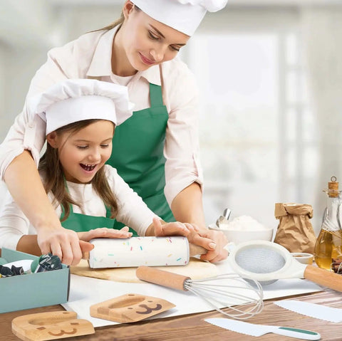 Child and adult using baking tools from 20 Piece Kids Safe Knife Set For Real Cooking, Montessori Kitchen Tools For Toddlers.