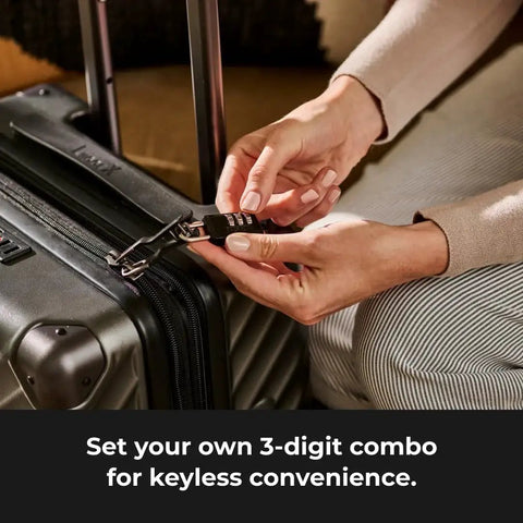 Person setting a Three Dial Combination Padlock for Indoor Lockers Luggage and Cabinets on a suitcase zipper.