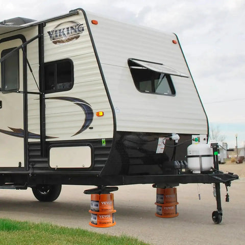 RV stabilized with Trailer Jack Block 2000 Lbs Capacity Per Block For No Sweat RV Leveling Polypropylene Camper Stabilizer Blocks