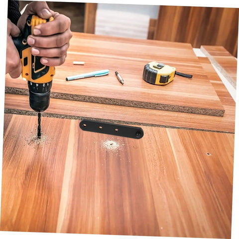 Installation of 4 Pack Stainless Steel Concealed Hinges For Doors And Windows Hidden Cabinet Hinges with drill and tools on wood surface