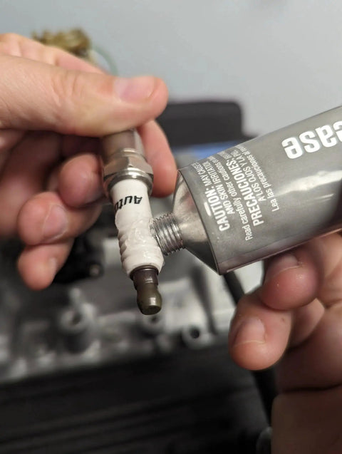 Applying Dielectric Tune Up Grease For Electrical Connections And Wiring In Cars And Trucks Protects Terminals Spark Plugs And Sockets From Salt Dirt And Corrosion Permatex 22058 3oz to spark plug.