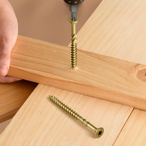 Person using Multi-Purpose Wood Deck Screws Number Nine By Two And A Half Inch Bugle Head Golden Coating T25 Torx Star Drive for building.