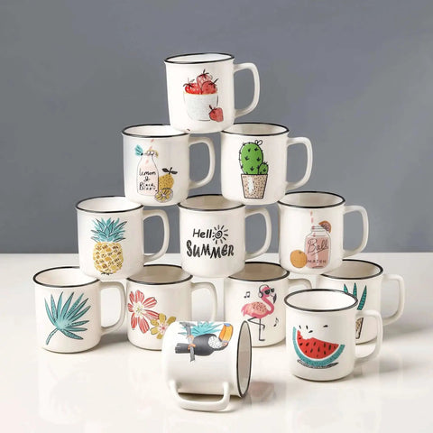 Stacked ceramic mugs with colorful summer-themed designs. Each mug features different illustrations like fruit and plants.