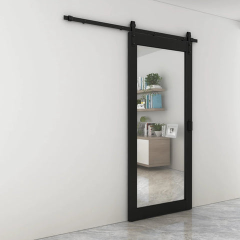 Dope Mirrored Glass Sliding Barn Door In Black MDF With Hardware Kit And Door Handle Ready To Hang Pre Finished 36 In By 84 In Interior Door With Full Size Mirror Panel For Closets Bathrooms Pantries Laundry Rooms And Bedrooms installed on white wall, full view with reflective surface.