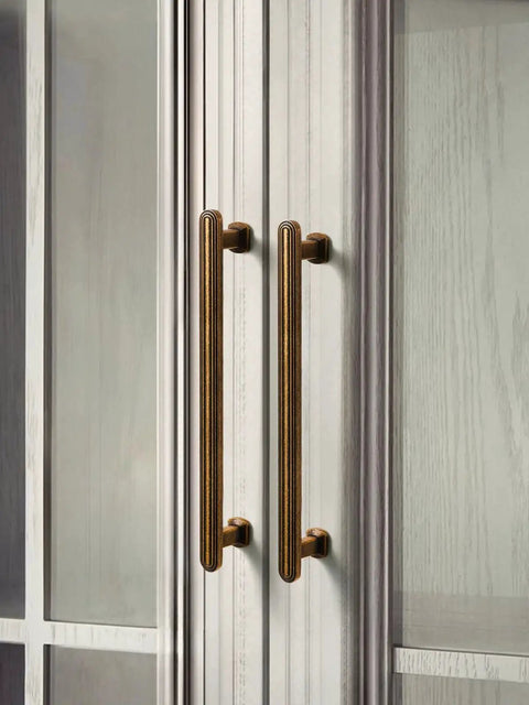 10 Pack Antique Brass Cabinet Pulls 3 Inch 76mm for kitchen cabinets installed on white wooden doors