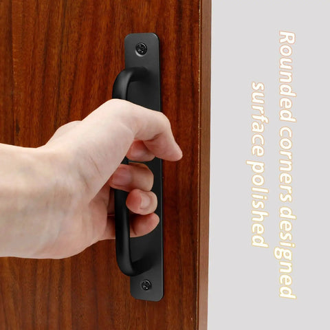 Hand holding 2 Pack Aluminum Alloy Sliding Barn Door Handles With Mounting Plates Black Finish 8.5 Inch Total Length 192 Mm Hole Center