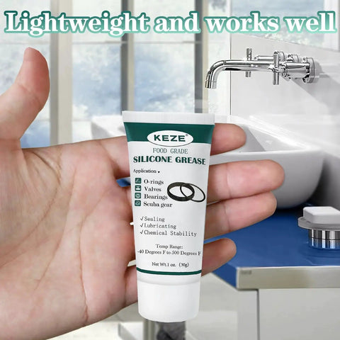 Hand holding Food Grade Silicone Lubricant For Faucets Valves O Rings Plumbers Grease 1 Oz tube near sink