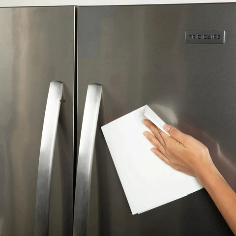 Using Miracle Cleaning Cloths 4 Pack Just Water Streak Free Reusable 16x16 on stainless steel fridge