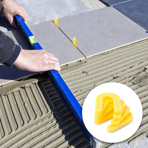 Must-Have Plastic Shims Set 200 Pcs Horseshoe Spacers U Shims For Leveling In Black 1/4 Inch Yellow 3/16 Inch Red 1/8 Inch Blue 1/16 Inch Durable PP Material, 4 Colors, 50 Pcs Each used for leveling tiles with yellow spacers.