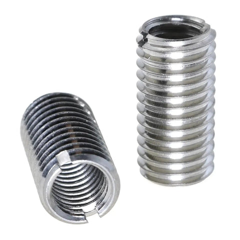 Two stainless steel threaded adaptor sleeves; M10x1.5 male to M8x1.25 female, metal repair inserts.