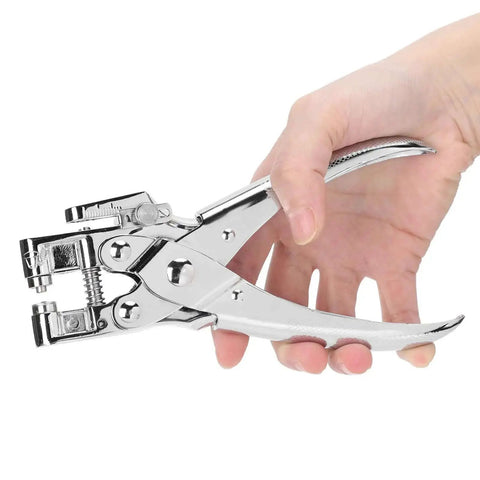 Person holding Metal Handheld All In One Hole Puncher With Retainer For Office And Home Use Manual Punching Tool, adjustable depth visible