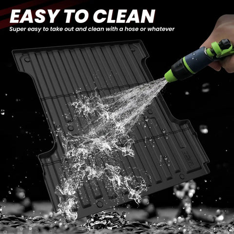 Close-up of 5.5 Foot Truck Bed Mat for Ford F 150 2024 2025 2026 67.1 Inch Bed Custom Fit All Weather TPE Liner being rinsed off.