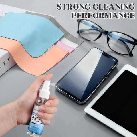 30 Pack Microfiber Cloths For Glasses And Electronics With 2 Lens Sprays, shown with glasses, smartphone, and tablet on table