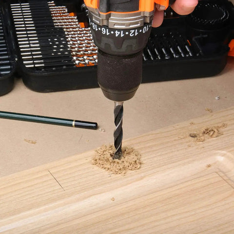 Close-up of drill in use for wood drilling with All-In-One 246-Piece Drill Bit and Driver Set for Wood, Metal, Concrete Drilling.