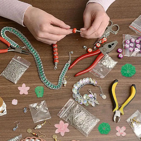 Crafting with Dope Lotus Acrylic Beads Set, 24 Pieces In 7 Styles, tools and jewelry making items on table