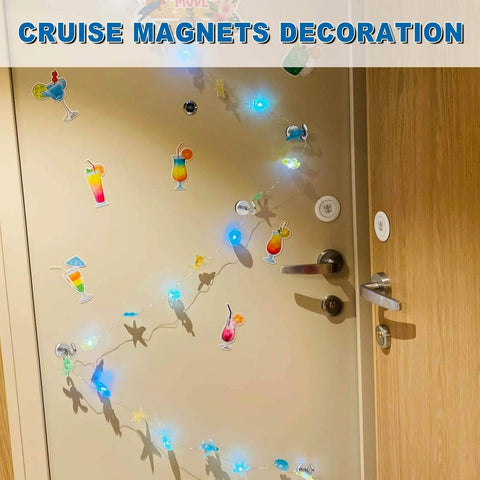 Door decorated with cruise-themed magnets and colorful lights, featuring cocktails and star shapes, labeled 'Cruise Magnets Decoration'.
