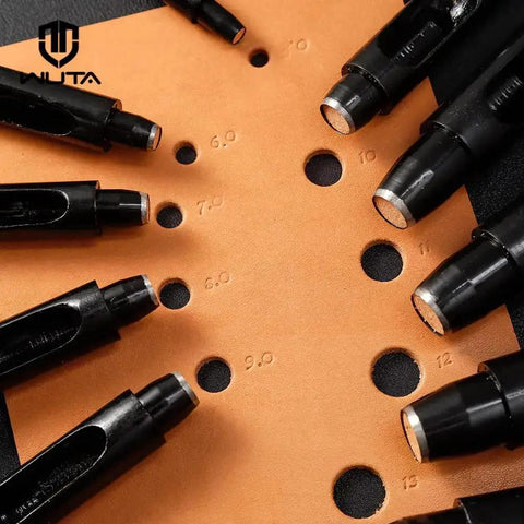 Round Hole Punch Set For Leather, Watch Bands, Belts, And Crafting displayed on punched leather surface