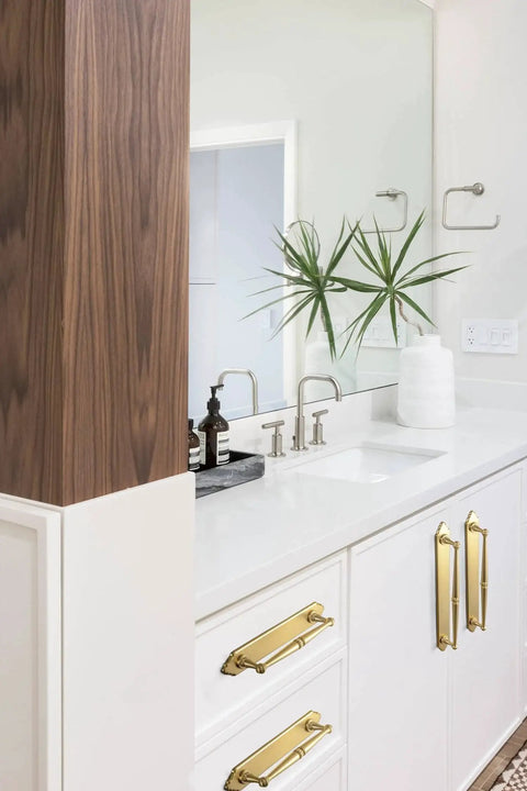 Champagne Bronze Cabinet Pulls 5.04 Inch Center To Center With Back Plate Zinc Alloy 2 Pack installed on white bathroom cabinets.