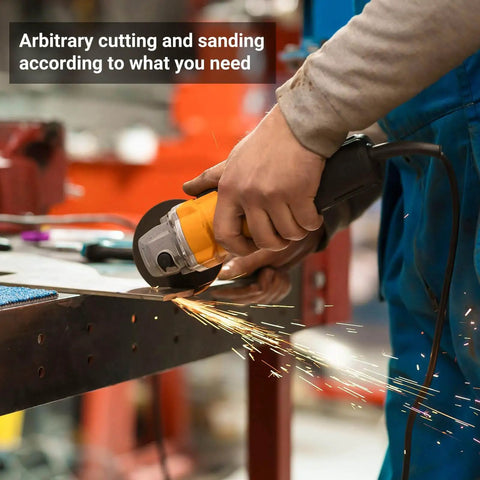 Person using an angle grinder to cut metal on a workbench creating sparks in a workshop setting