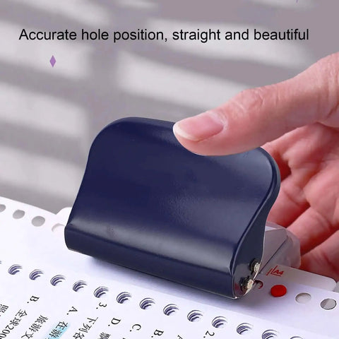 Hand using 6 Hole Punch For A4 A5 B5 Loose Leaf Notebooks And Scrapbooks, Metal Circle Paper Puncher, 5 Sheet Capacity