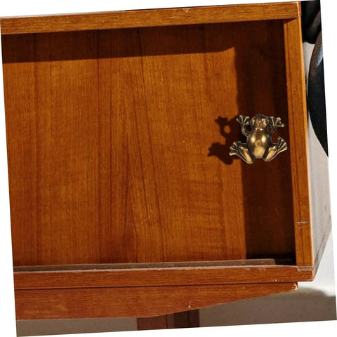 Wooden drawer with attached Frog Shape Pull Handle from Frog Shape Pull Handles 2 Pack Vintage Style Metal Cabinet Drawer Pulls For Wardrobe Dresser And Kids Room Hardware Durable Frog Design With Retro Charm 1.73 X 1.41 X 0.94 Inches And Easy Mounting.
