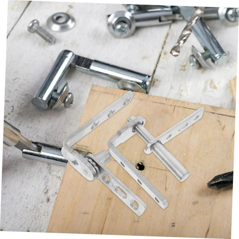Heavy Duty Stainless Steel Pivot Hinges With Auto Close for Hidden Sliding Doors and Concealed Bookcases displayed on wood