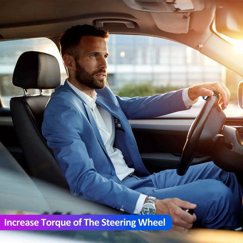 Man driving with Spinner Knob Steering Wheel Buddy With 360 Degree Rotation For Easy Driving in a car
