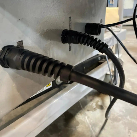 Installed view of 22 Piece Cable Gland Kit For Electrical Installations With PG7, PG9, PG11, PG13.5, PG16, PG21, White Nylon Waterproof Flexible Spiral Strain Relief Glands