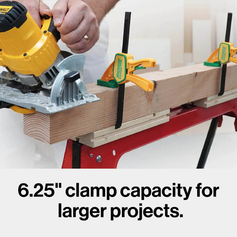 Person using a yellow saw with Grr-rip Grip-Strong Dovetail Clamps Two-Pack For Woodworking Jigs And Sleds on a workbench.