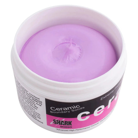 Shark Ceramlub ceramic brake lubricant paste in an open white jar with purple paste