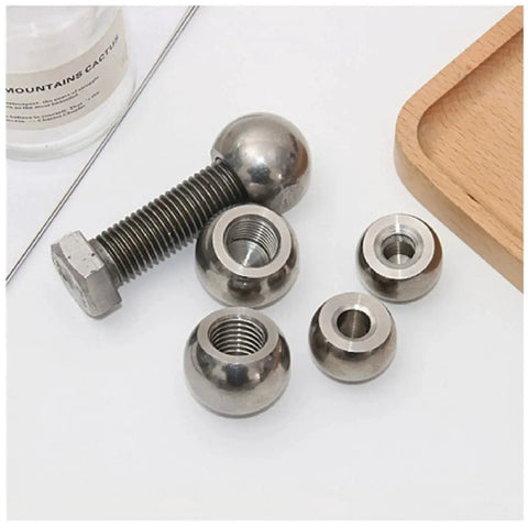 Stainless Steel Piercing Replacement Balls M6 Threaded Half Hole 10 12 Mm with polished finish, screw and wooden tray visible.