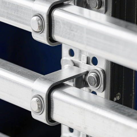 Flat washers on metal rail hardware; 304 stainless steel washers on bolts, industrial framing.