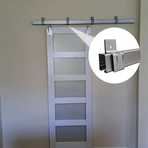 Heavy Duty Box Rail Hanger Bracket For Exterior Barn Door Hardware Rail Mount Bracket With Included Bolts Black 4 Pack Durable Rust Resistant Alloy Steel Construction For Outdoor Use, installed on wall with door.