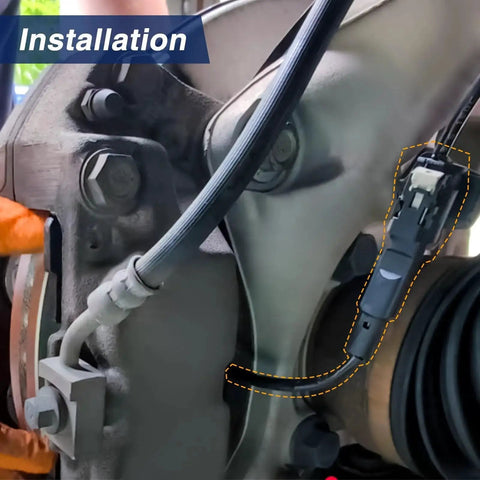 KPALAG front disc brake pad wear sensor with wiring harness installed on brake caliper