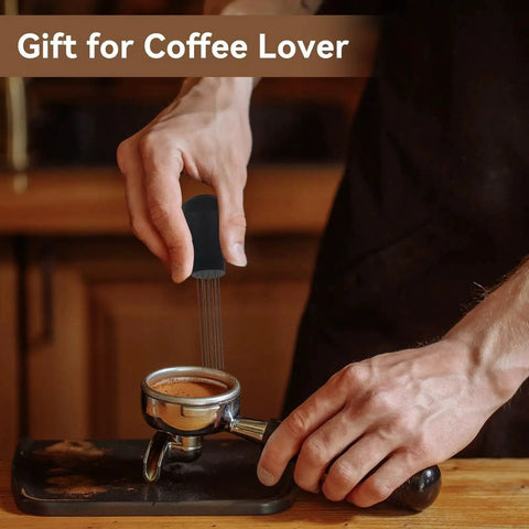 Person using Espresso Distribution Tool With 0.4mm 10 Needle Stirrer Break Up Grounds Reduce Channeling Achieve Even Extraction For Home And Commercial Espresso Machines Black on portafilter.