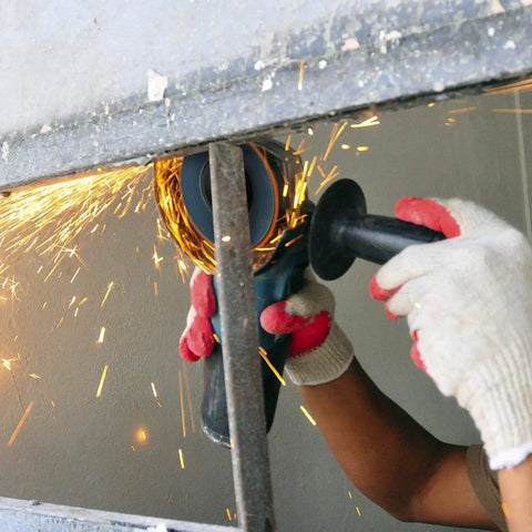 Person using Heavy Duty Flap Discs Set For Metal Wood Concrete With Four And A Half Inch Size And Seven Eighths Inch Arbor T29 Zirconia Grinding Wheel