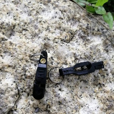 Heavy Duty Offshore Fishing Line Clips With O Rings For Planer Boards And Outriggers on rock surface