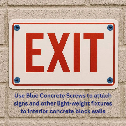 Exit sign installed on concrete wall using blue concrete screws.