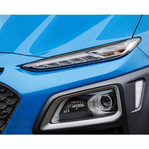 Close-up of blue car bumper showcasing detailed design and headlights, ideal for applying Crystal High Gloss Auto Clear Coat Pen 1.5 Oz For Cars Touch Up And Peel Repair.