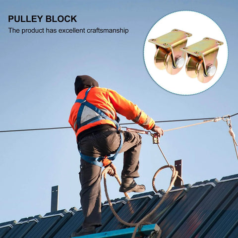 Heavy Duty Steel Pulley Block With V Type Groove For Sliding Gates And Industrial Track Doors 2 Pack shown in use by worker on rooftop
