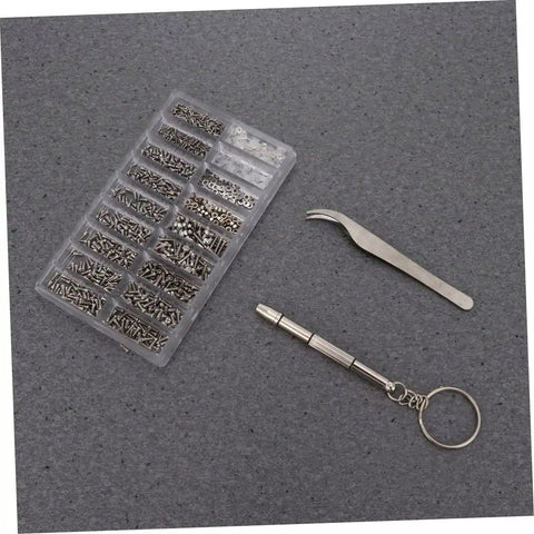 1000 Piece Stainless Steel Miniature Screws Kit For Glasses Phones Watches And Eyewear With Screwdriver And Tweezers Included All In One Assorted Sizes Rust Resistant Easy Install Go To Repair Set on a gray background