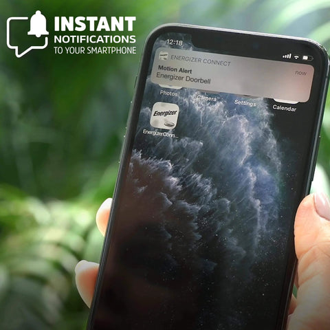 Smartphone displaying instant notification from 1080P Wired Video Doorbell For Real Home Security With 140 Degree Field Of View.