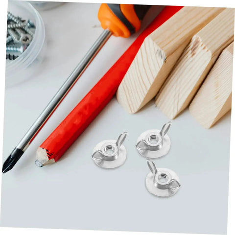 20 Piece Stainless Steel Wing Nut Set For Hurricane Shutter Fasteners with scuba backplate bolts and tools on wooden surface