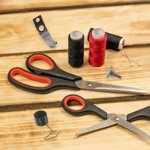 Pro Grade Sewing Machine Replacement Screw Kit With Spring Set for Industrial Flat Machines on wooden surface with scissors and threads.