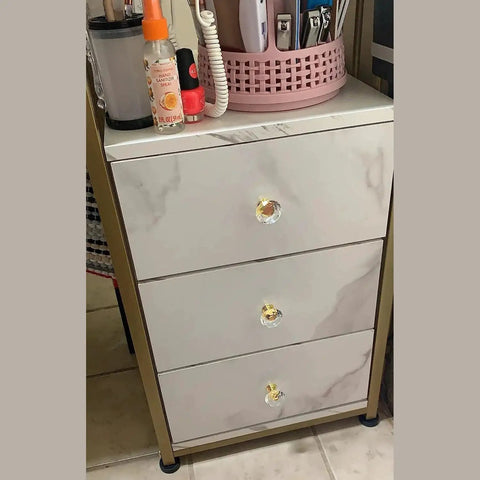 Dresser with 8 Pack Crystal Glass Cabinet Knobs With Gold Base Diamond Style Drawer Pulls, showcasing elegant hardware installation.