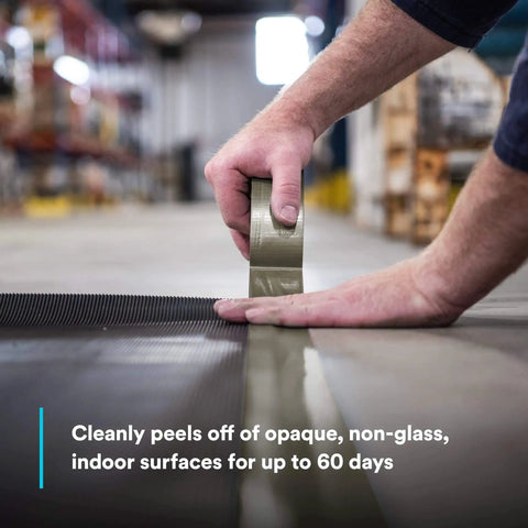 Applying Extra Heavy Duty Olive Duct Tape 6969, Industrial Strength Water-Resistant 10 mil, 48 mm x 54.8 m Roll on surface