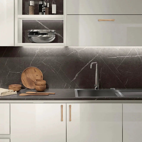 Modern kitchen with 10 Pack 5 Inch Champagne Bronze Cabinet Handles For Kitchen Cabinets And Furniture Pulls installed on white cabinets.